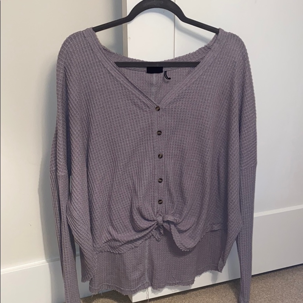 Out from under oversized thermal button-front top